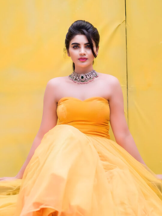 Jabardasth Varsha in yellow gown photoshoot