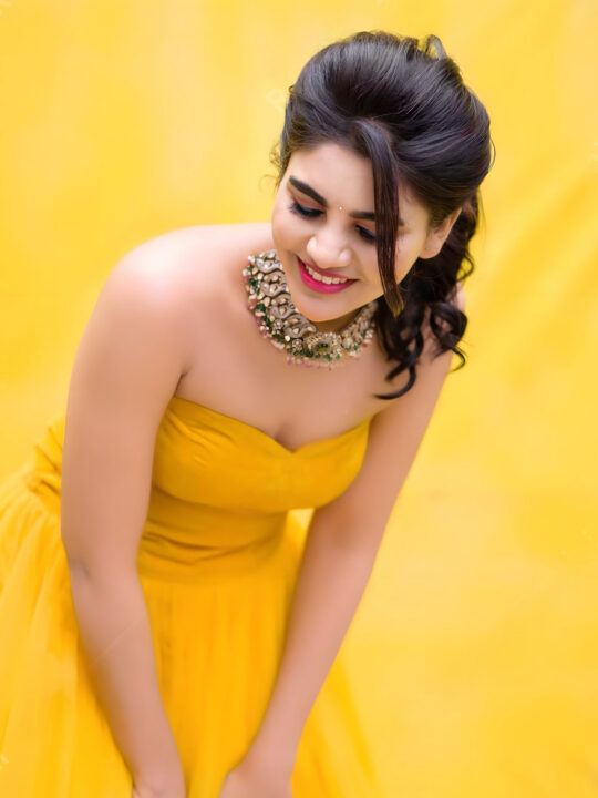 Jabardasth Varsha in yellow gown photoshoot