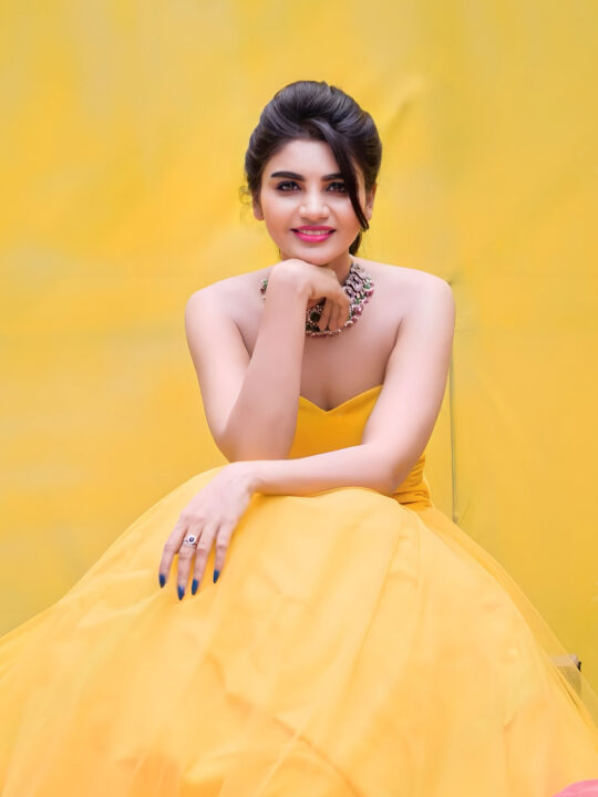 Jabardasth Varsha in yellow gown photoshoot