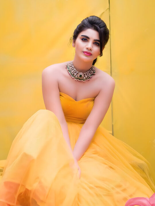 Jabardasth Varsha in yellow gown photoshoot