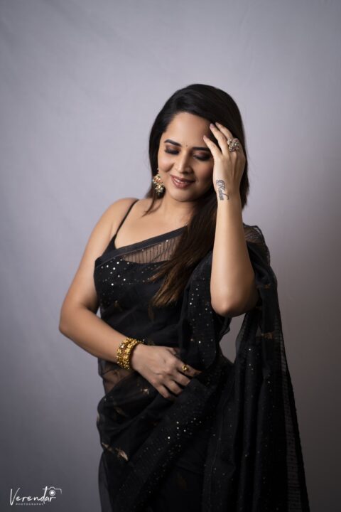 Anasuya Bharadwaj sizzles in black saree
