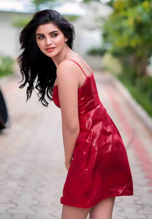 Jabardasth Varsha sizzles in red short dress