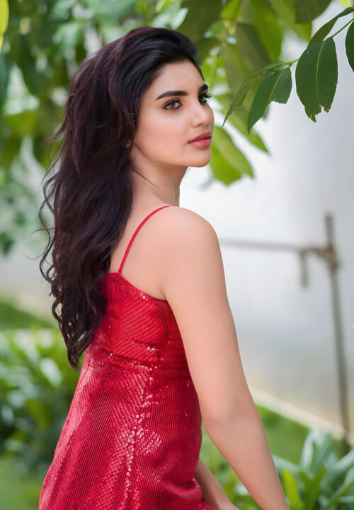 Jabardasth Varsha sizzles in red short dress