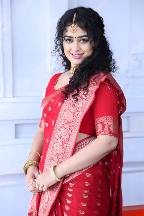 Apsara Rani in red saree photos