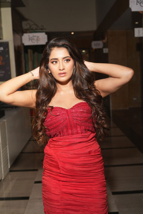 Rashi Singh sizzles in red corset slit gown
