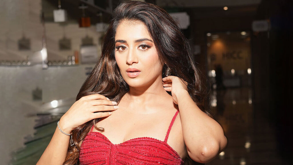 Rashi Singh sizzles in red corset slit gown