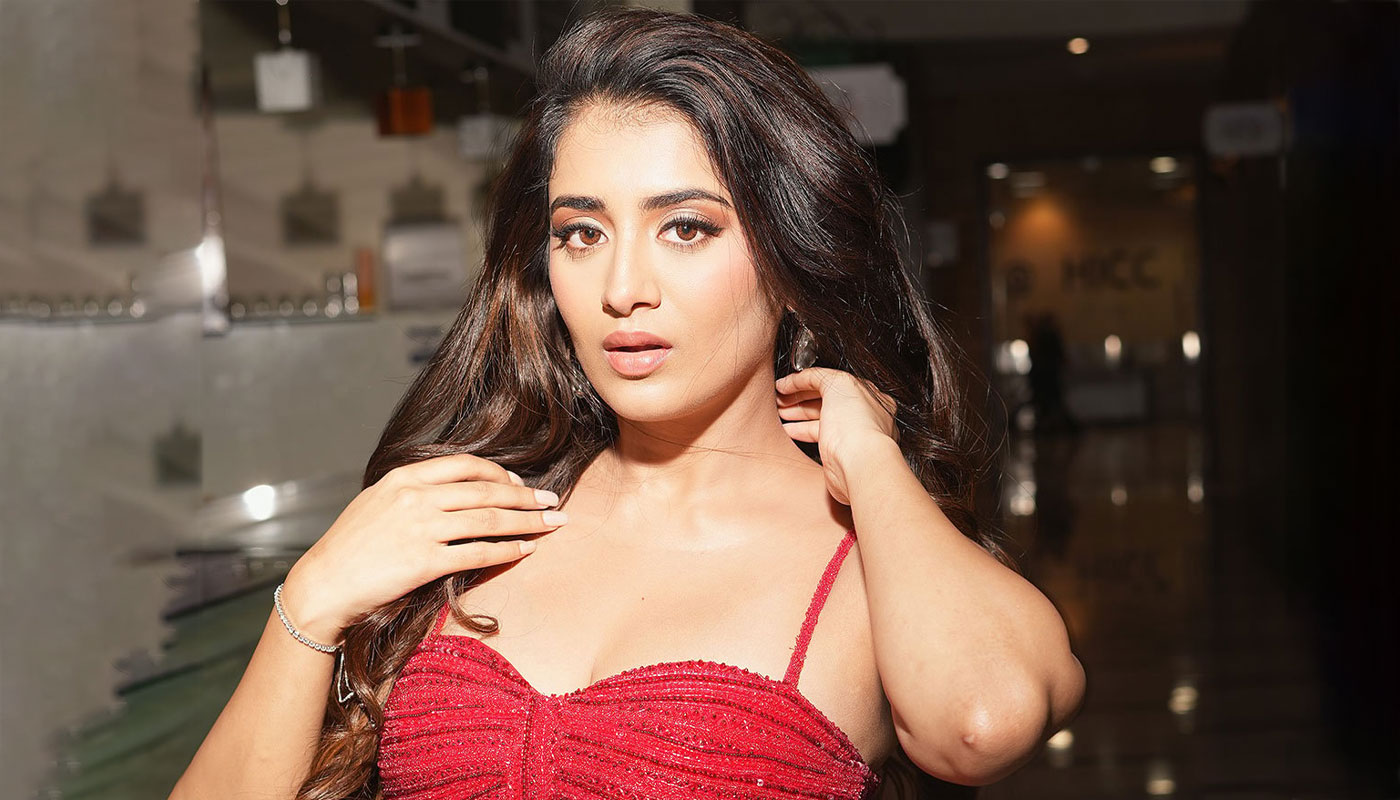 Rashi Singh sizzles in red corset slit gown