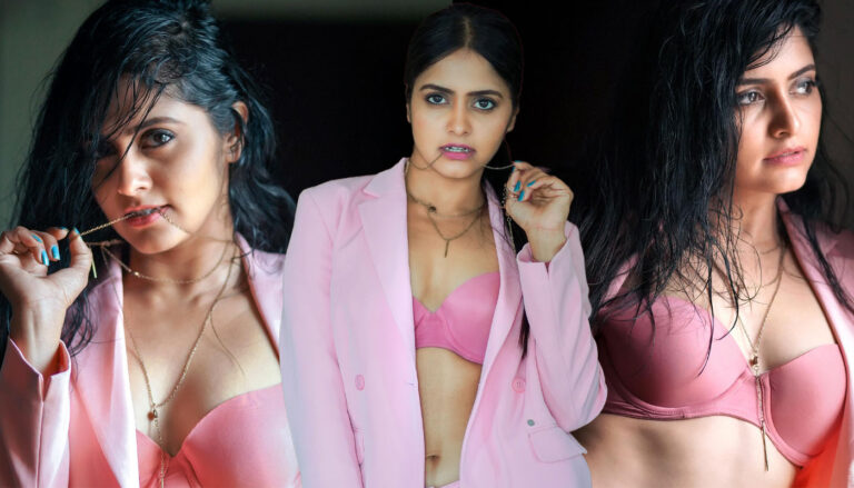Pragya Nayan sizzling stills in unbuttoned pink blazers