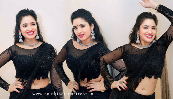 Rathika Rose hot navel stills in black saree