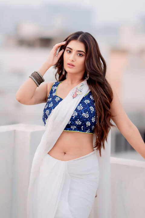 Rashi Singh sizzling navel stills in white saree