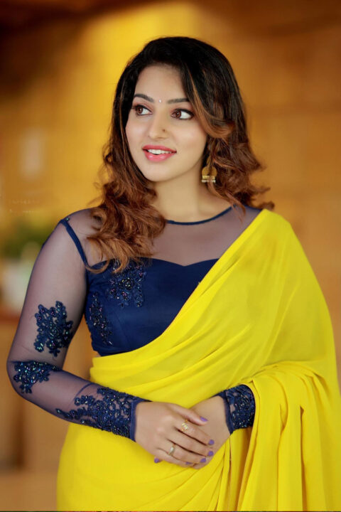 Malavika Menon in yellow saree photo