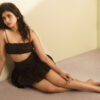 Meenakshi Govindharajan Sizzles in Black mini skirt