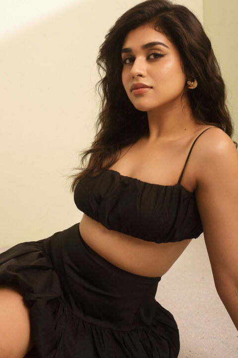 Meenakshi Govindharajan in Black Bralette and Mini Skirt