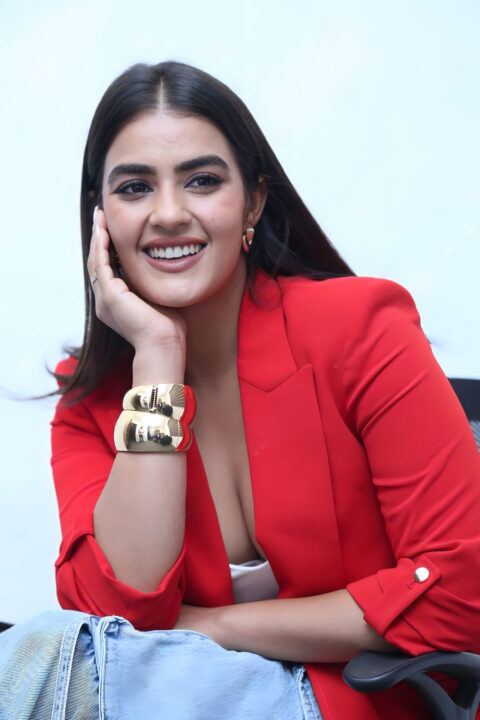 Kavya Thapar Stuns in Red Blazers at Double iSmart Interview