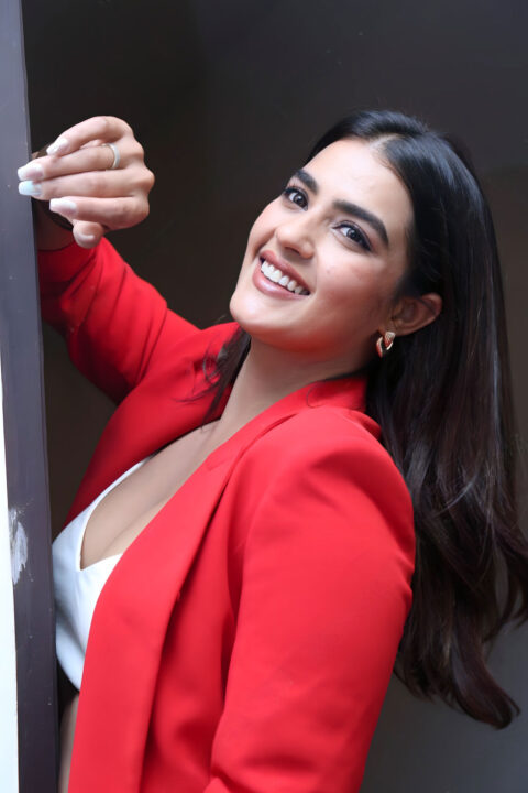 Kavya Thapar’s Hot Look in Red Blazers at Double iSmart Interview