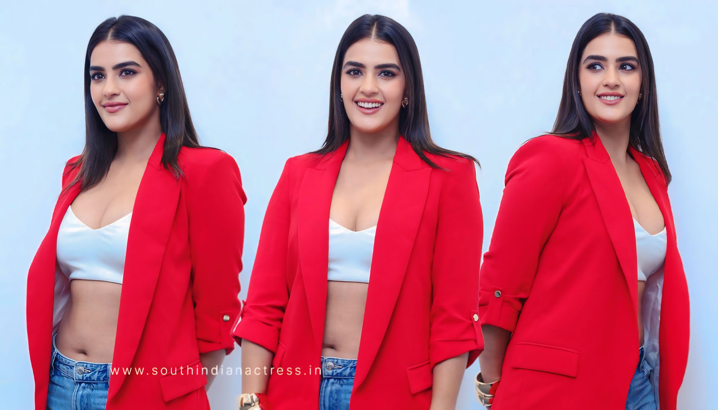 Kavya Thapar Sizzles in Red Blazers at Double iSmart Interview