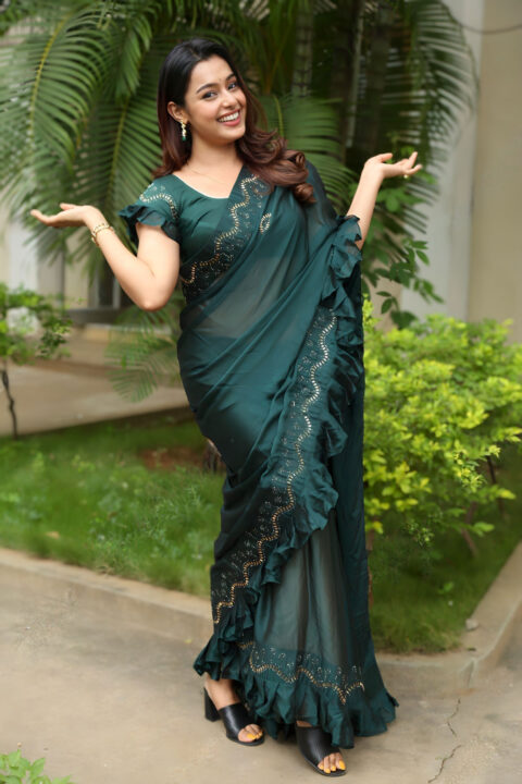 Mokksha’s Elegant Look in Dark Green Saree at Alanati Ramachandrudu