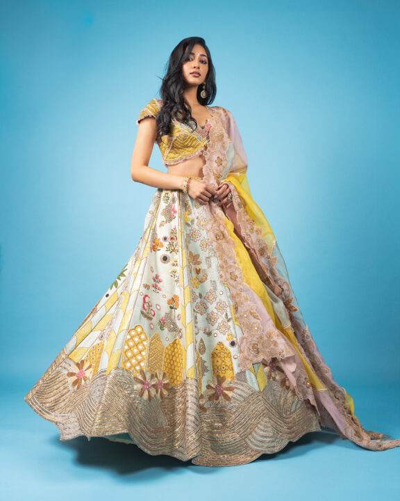 Preity Mukhundhan’s Radiant Photoshoot in Gold Wave Lehenga