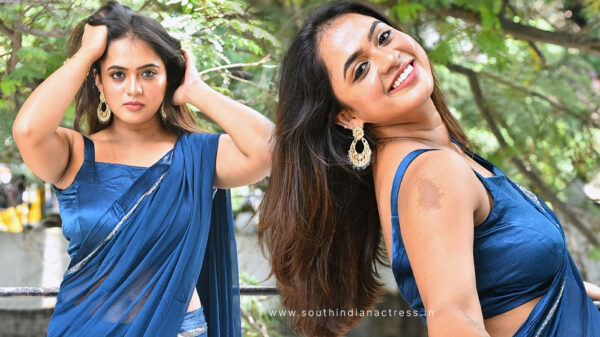 Dharani Priya Madhekar Stuns in Dark Blue Saree at The Deal Poster Launch