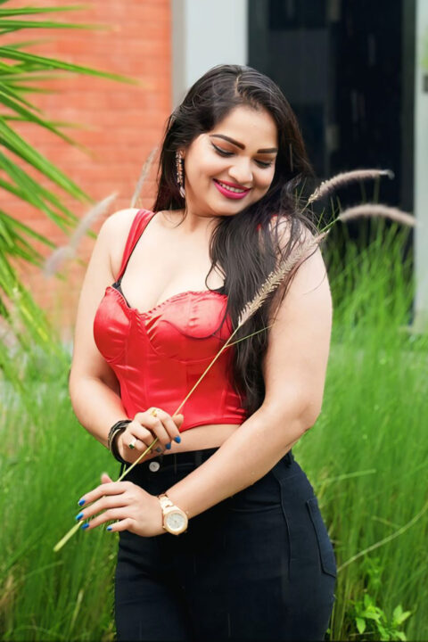 Ashwini Sree Flaunts Bold Look in Red Corset Top and Black Pants