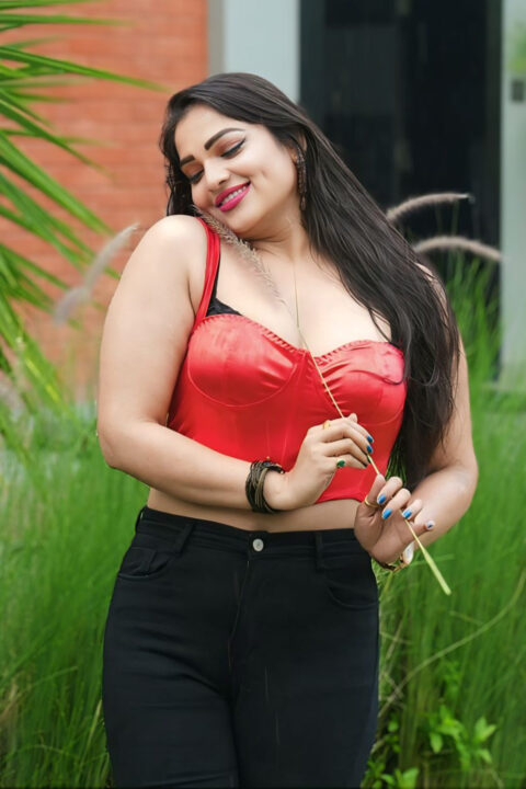 Ashwini Sree Bold Red Corset Top and Black Pants Look