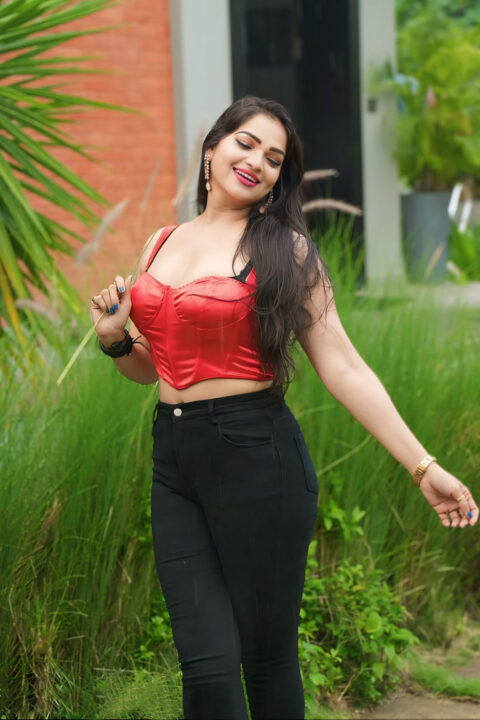 Ashwini Sree Glamorous Look in Red Corset Top and Black Pants