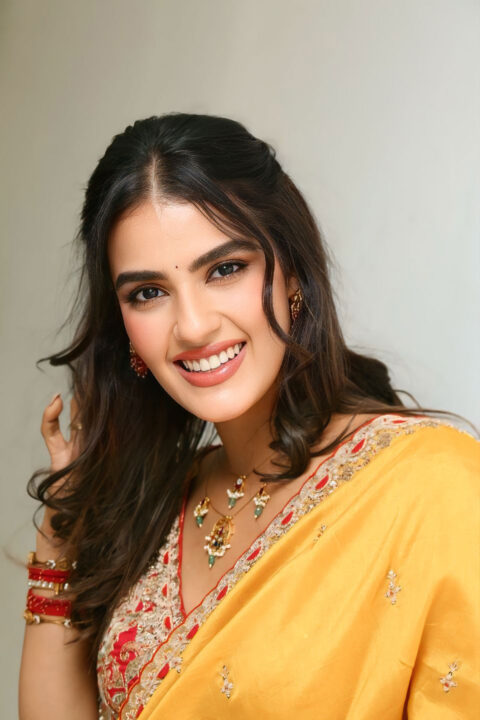 Kavya Thapar Stuns in Yellow Saree at Viswam Interview