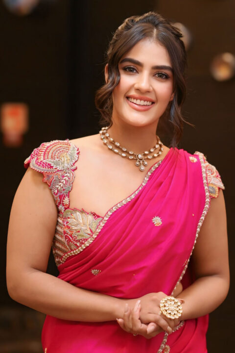 Kavya Thapar Stuns in Viscose Crepe Pink Saree at Viswam Pre-Release Event