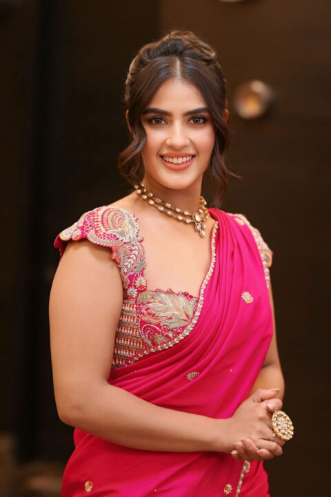 Kavya Thapar Stunning Pink Saree Look at Viswam Pre-Release Event