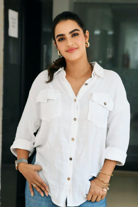 Kavya Thapar Effortless Style in White Shirt and Denim at Viswam Meet