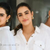 Kavya Thapar Flaunts Casual Elegance in White Shirt and Denim at Viswam Event