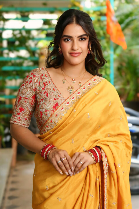 Kavya Thapar in Traditional Yellow Saree Look at Viswam Interview