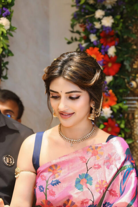 Sreeleela Steals the Show in Floral Saree at MAANGALYA Mall