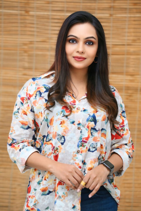 Tanvi Ram Stills in Floral Shirt and Torn Denim from KA Movie Interview