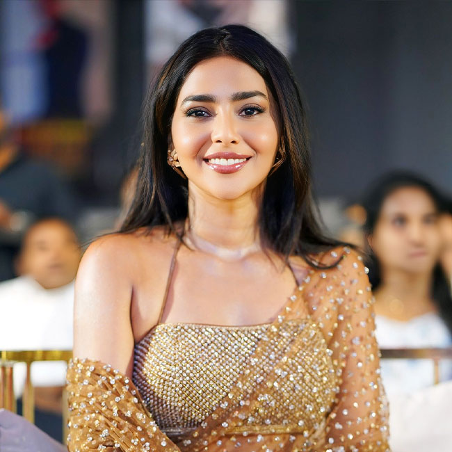 Aishwarya Lekshmi Shines in Metallic Gold Saree at Movie Launch Event