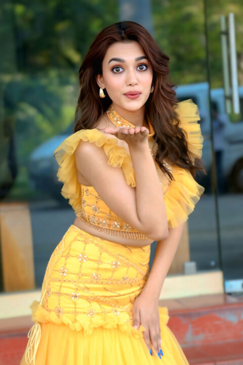 Vidhi Yadav rocks Yellow Net Lehenga at Kiss Kiss Kissik movie event