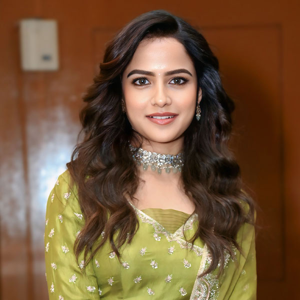 Vaishnavi Chaitanya stuns in parrot green anarkali at Kiss song launch