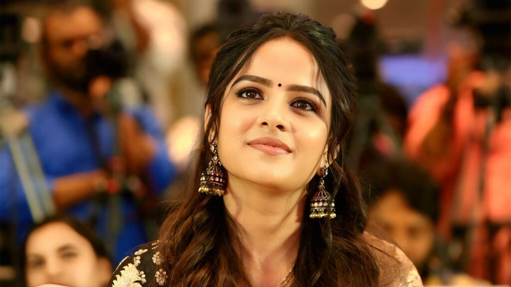 Vaishnavi Chaitanya makes heads turn in floral orange saree look