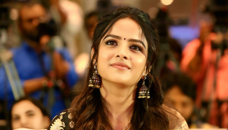 Vaishnavi Chaitanya makes heads turn in floral orange saree look