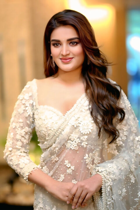 Nidhhi Agerwal glams up Hari Hara Veera Mallu song launch in white