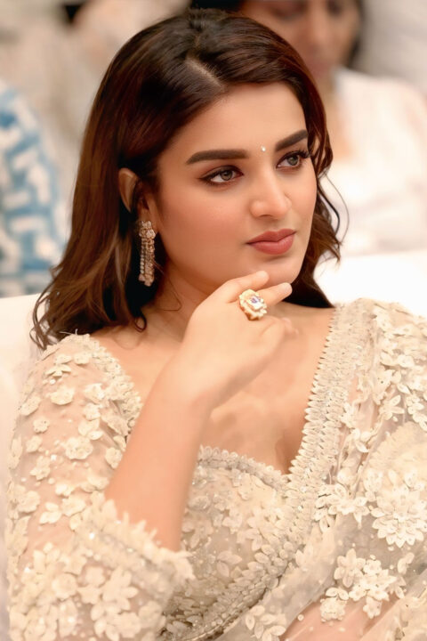 Nidhhi Agerwal in elegant white saree look at Veera Mallu song launch