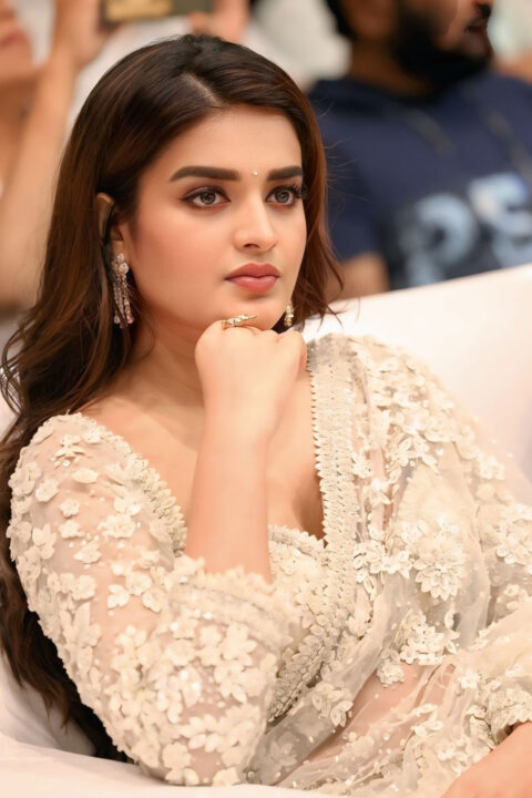 Nidhhi Agerwal stuns in sheer white saree at Veera Mallu celebration