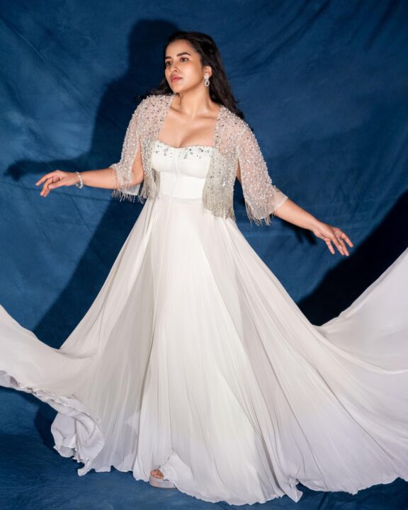 Komalee Prasad Captivates in White Gown and Beaded Jacket Stills