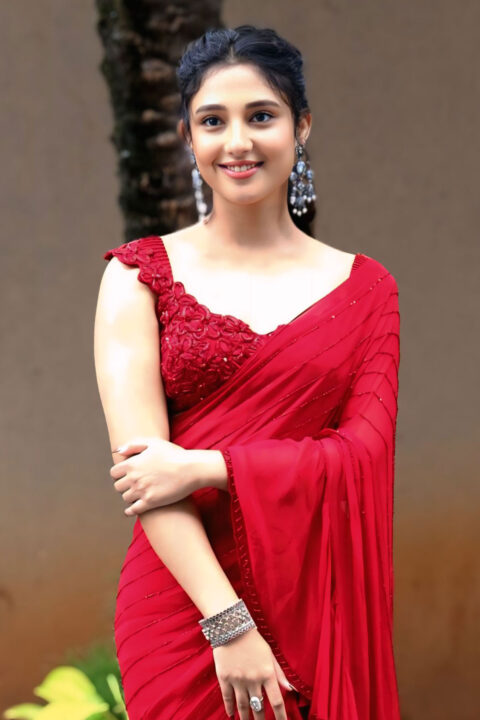 Ritika Nayak in Success Meet Outfit: A Red Ruffle Saree