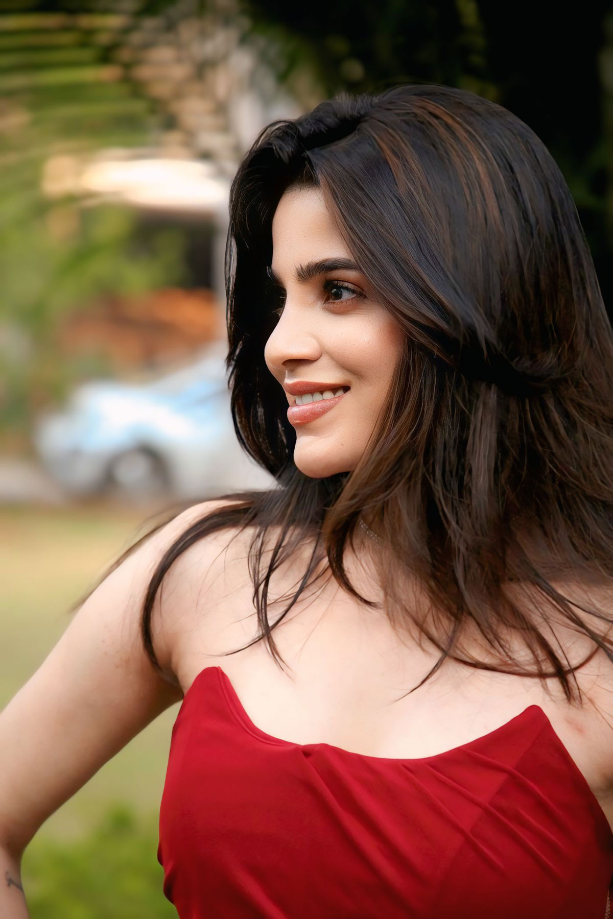 Divyabharathi in Minimal Accessories with Bold Red Outfit