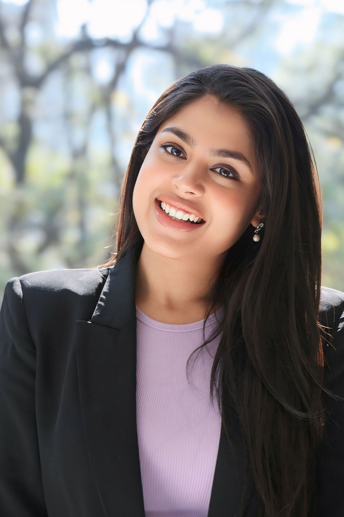 Faria Abdullah Pairs Black Suit with Lavender Crop Top