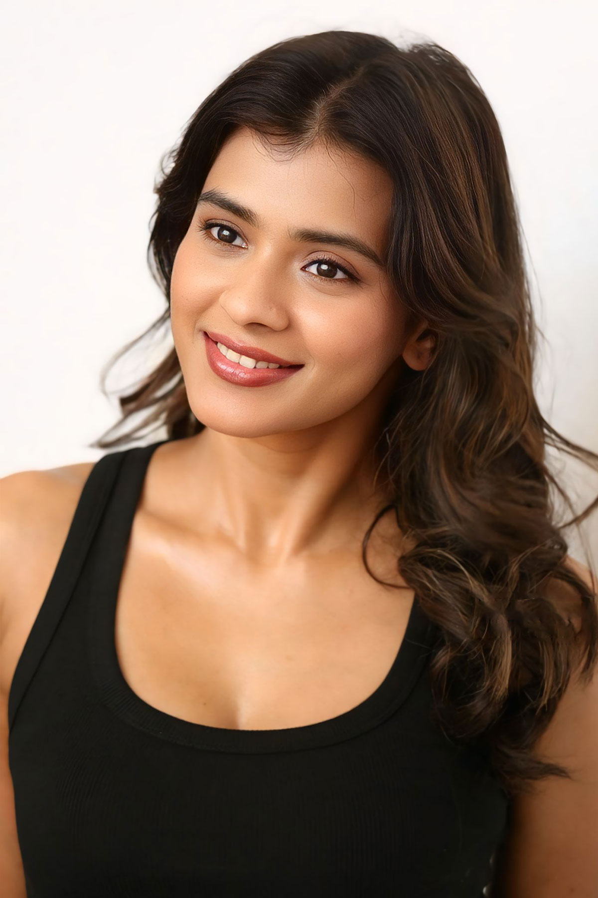 Hebah Patel Voluminous Waves and Defined Makeup Look