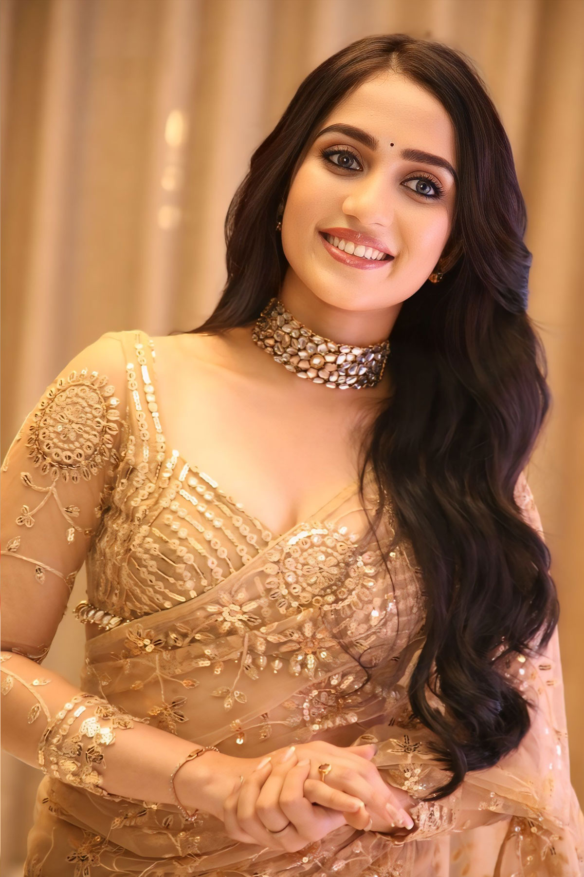 Sakshi Mhadolkar in Gold Shimmer Saree and Full-Sleeved Silk Blouse Look