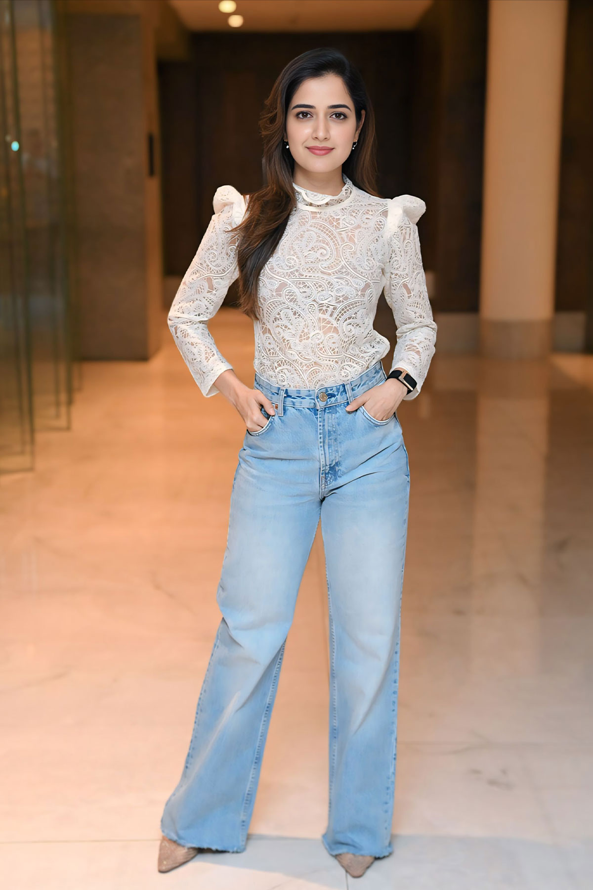 Ashika Ranganath Captivates in Transparent Lace at Movie Celebration