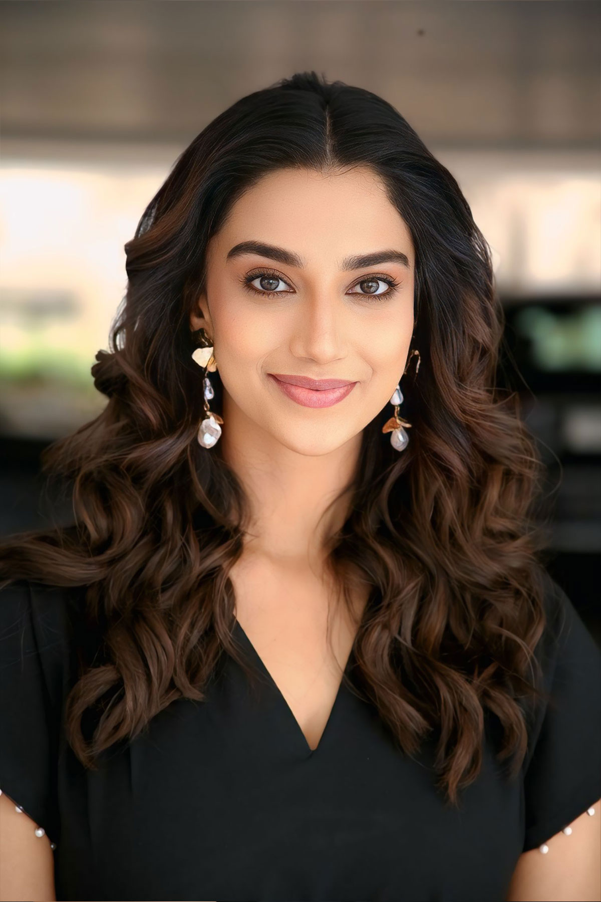 Meenakshi Chaudhary Rocks the Avim Black Midi from RAREISM